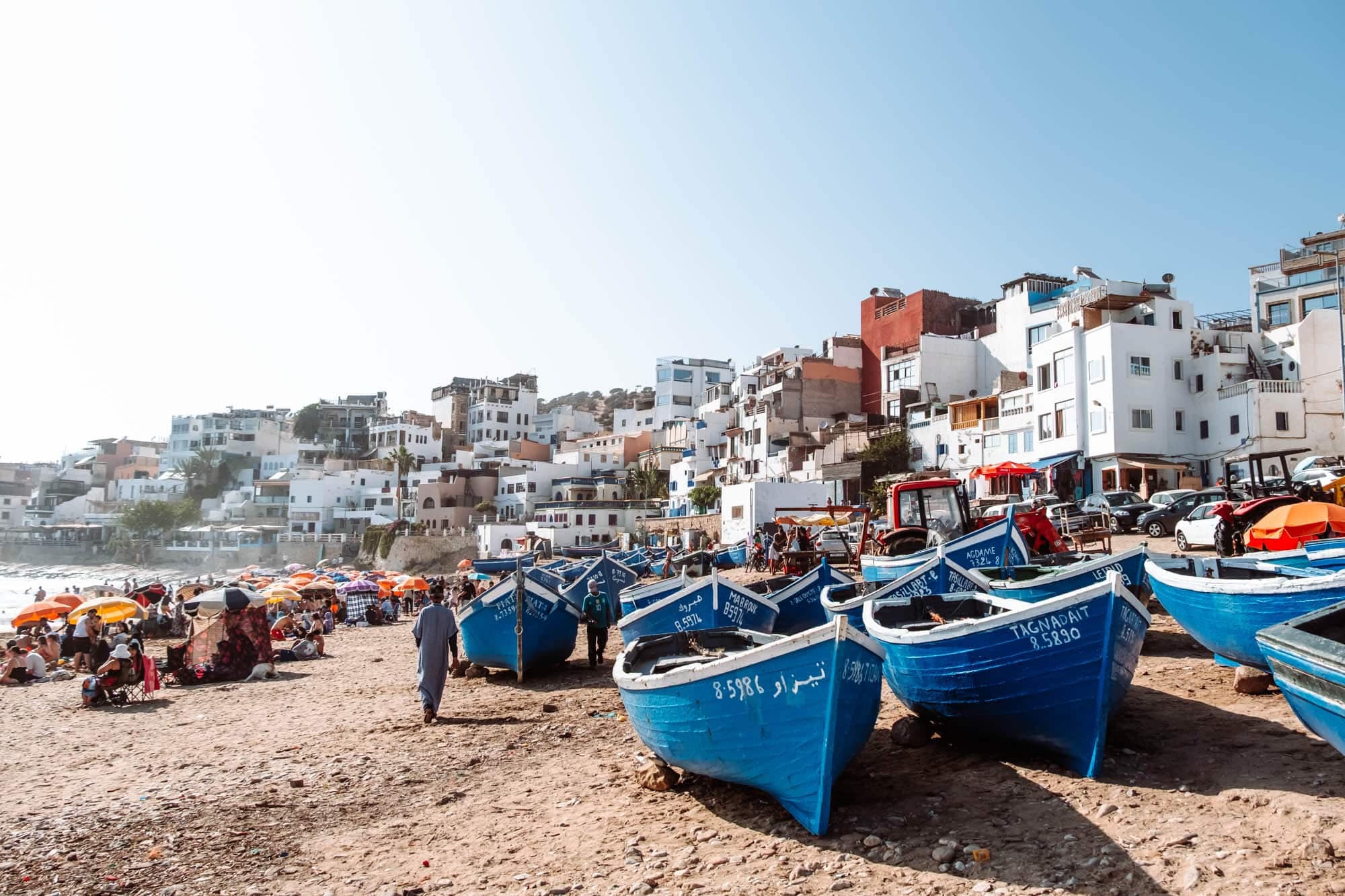 Taghazout coastal village with surf-town atmosphere along the Atlantic, a smaller alternative base near Agadir