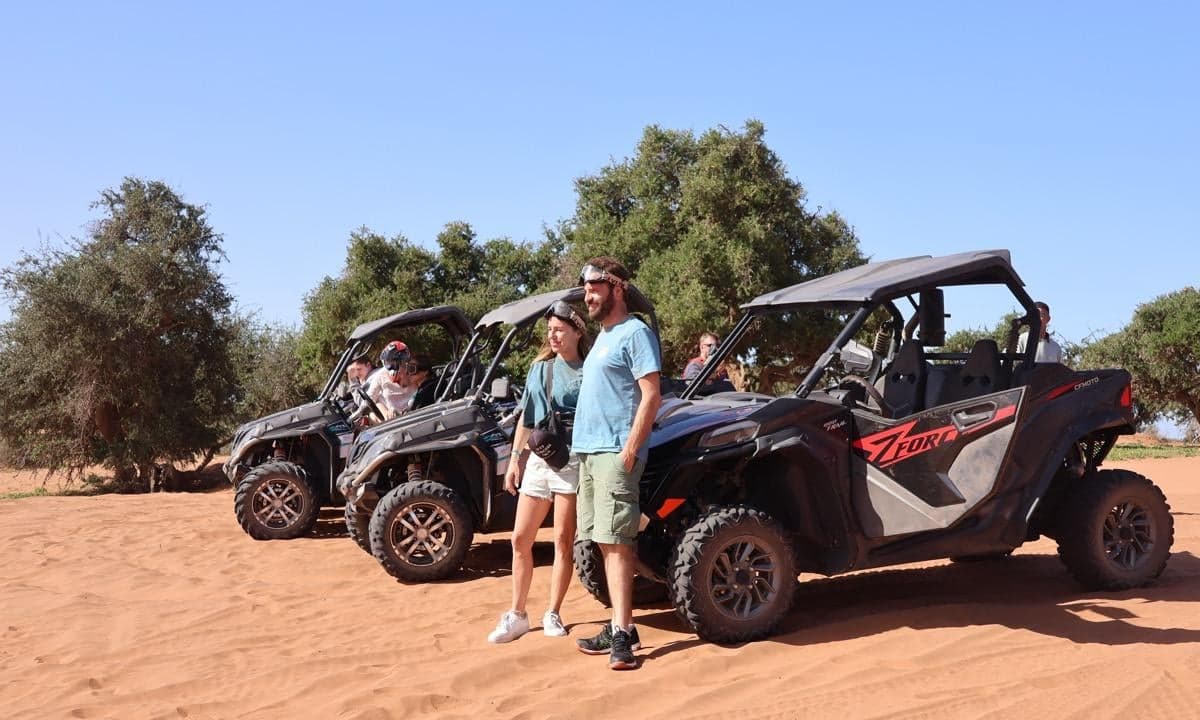 Buggy driving across open sand dunes on a desert tour near Agadir