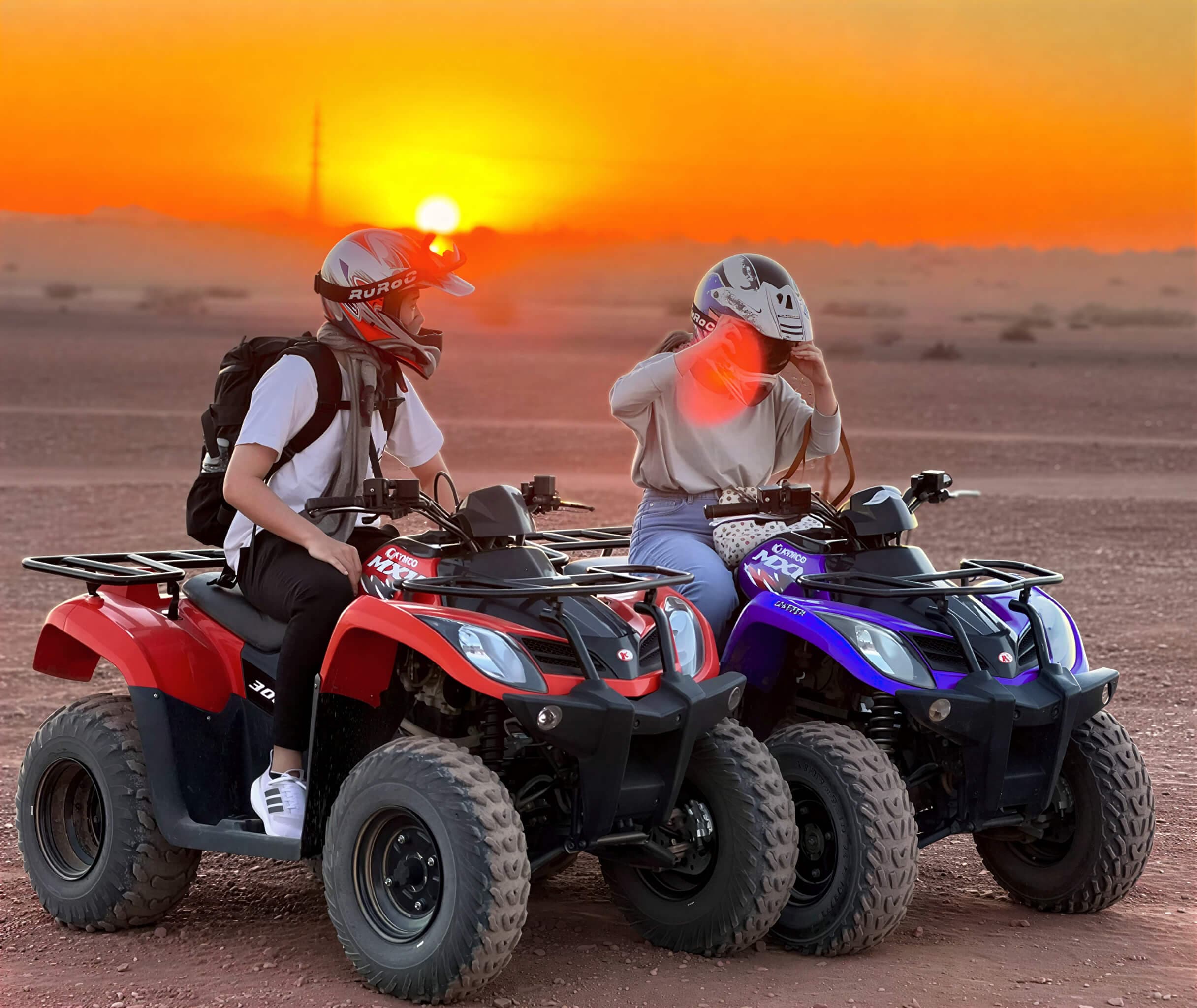 Quad riders on open sand tracks near Tamri during a half-day adventure from Agadir